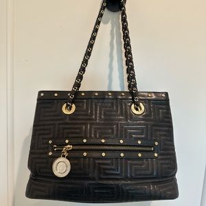 Barely used Versace Bag. Authentic Clean interior. Excellent condition